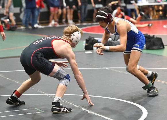FBHS wrestlers in action over the weekend include, clockwise from top left, Enzo Gamba, Cael Kubatzke, Elijah Smith, Gauge Housely and Nik Saldana.
