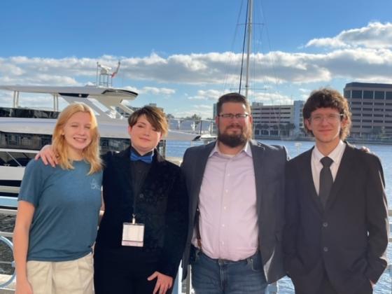 Band director Tyler Odom with Fernandina Beach high school band members who performed in the All State Concert in Tampa, Jan. 14. Submitted photo.