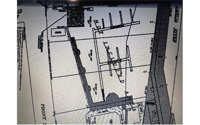 Brett’s at the bottom and the boat ramp at the top. The state's submerged lands lease is shown at the location of the breakwater and west and outside the city’s owned submerged lands under the marina. If the marina was located in “sovereign waters of the state of Florida,” it would also be shown as under the state lease as opposed to being shown as “not included.” Submitted photo.