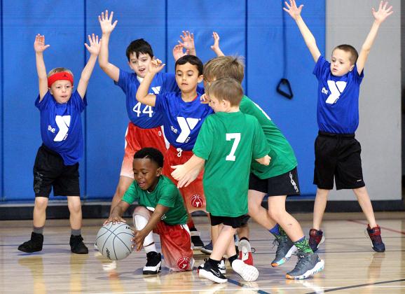 Youth hoops league opens season at YMCA.