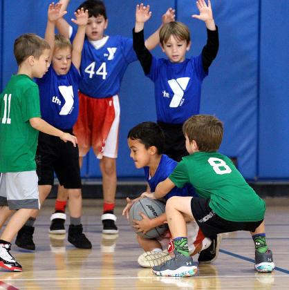 Youth hoops league opens season at YMCA.