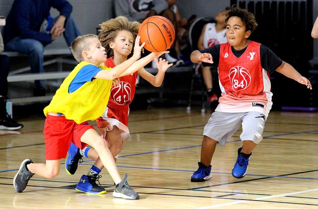 Youth hoops league opens season at YMCA.