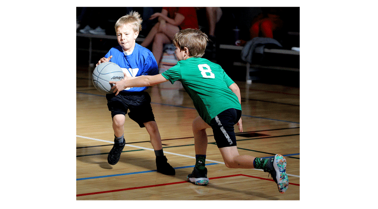 Youth hoops league opens season at YMCA.