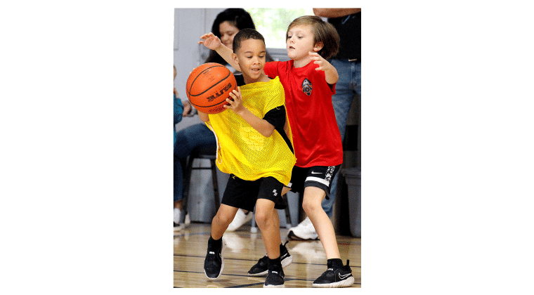 Youth hoops league opens season at YMCA.
