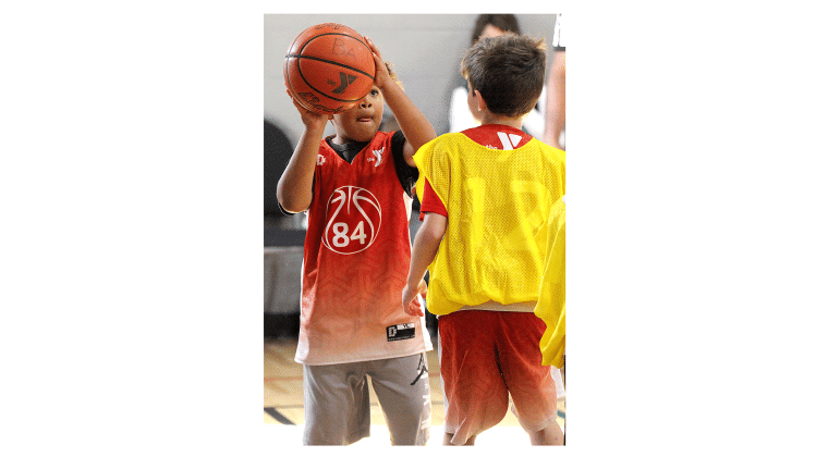 Youth hoops league opens season at YMCA.