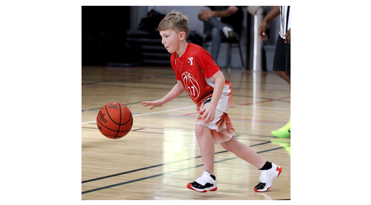 Youth hoops league opens season at YMCA.