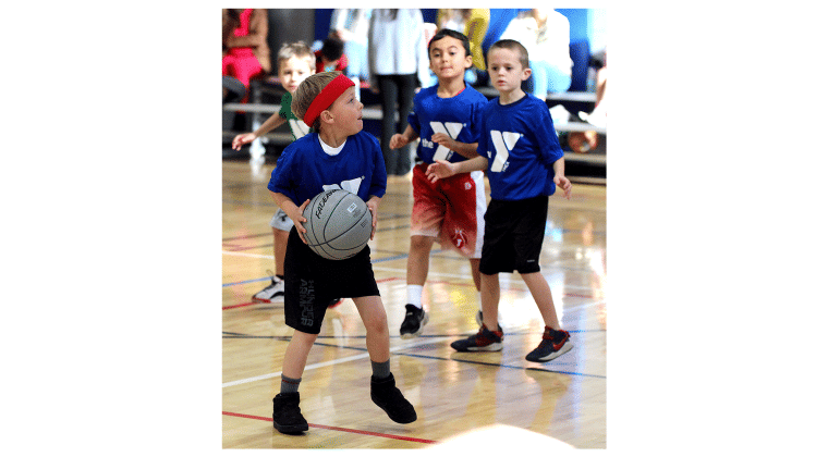 Youth hoops league opens season at YMCA.