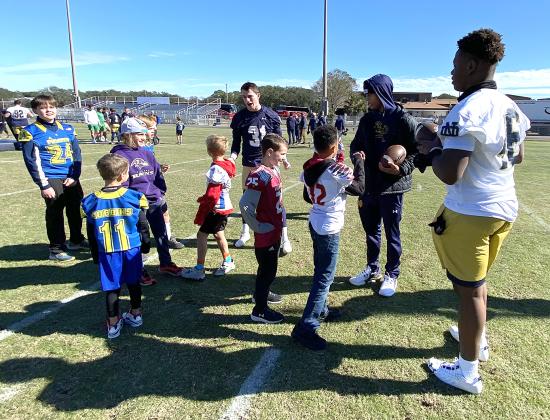 Growing the Game, a program through the TaxSlayer Gator Bowl, which allowed the youths to engage with Notre Dame football players.