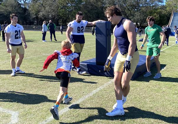Growing the Game, a program through the TaxSlayer Gator Bowl, which allowed the youths to engage with Notre Dame football players.
