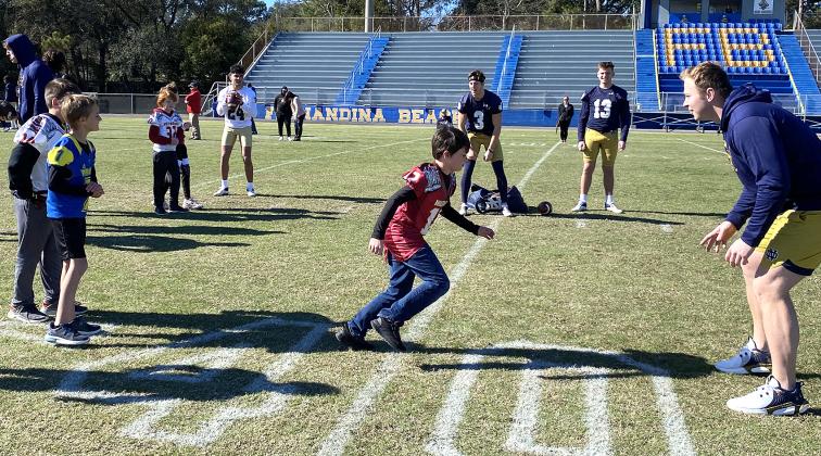 Growing the Game, a program through the TaxSlayer Gator Bowl, which allowed the youths to engage with Notre Dame football players.