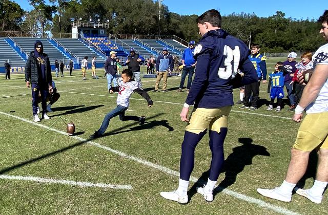Growing the Game, a program through the TaxSlayer Gator Bowl, which allowed the youths to engage with Notre Dame football players.