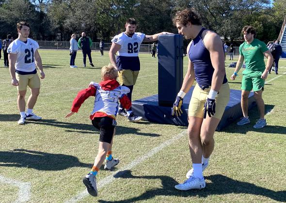 Growing the Game, a program through the TaxSlayer Gator Bowl, which allowed the youths to engage with Notre Dame football players.