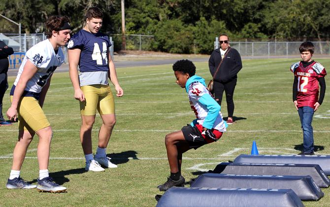 Growing the Game, a program through the TaxSlayer Gator Bowl, which allowed the youths to engage with Notre Dame football players.