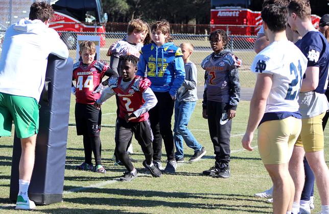 Growing the Game, a program through the TaxSlayer Gator Bowl, which allowed the youths to engage with Notre Dame football players.