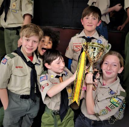 Matthew Gershowitz, Ian Pena, Dylan Meredith, Joshua Stone and Senior Patrol Leader Miley Meredith accepting the Top Unit award. Submitted photo