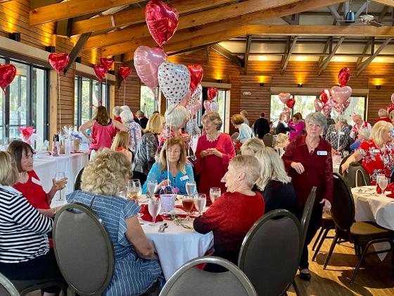 Members enjoying the Give a Heart Luncheon and Raffle, one of the Newcomers’ most festive events of the year. Submitted photo