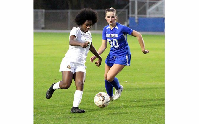 The Fernandina Beach and Yulee high schools’ girls soccer teams played Tuesday in the semifinal round of the district tournament at FBHS. Photo by Beth Jones/News-Leader