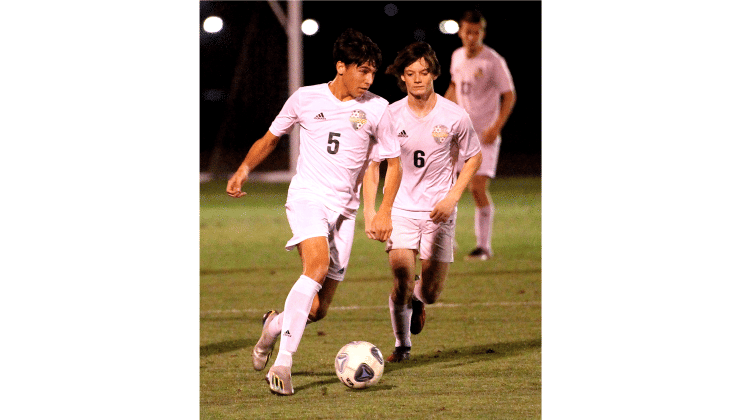 Hornets beat Crusaders to clinch region championship. Photo by Beth Jones/News-Leader