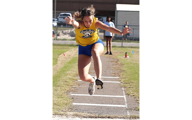 Hornets host Pirates in first track meet of season. Photo by Beth Jones