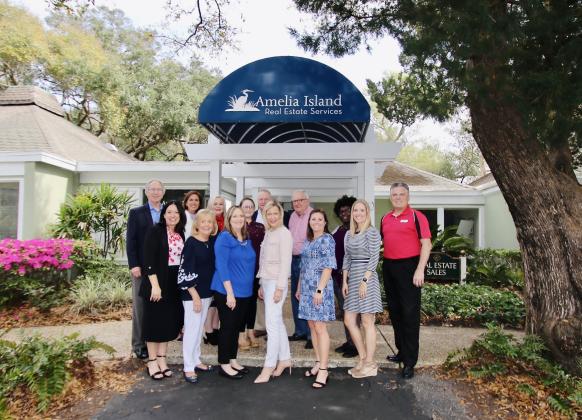 Pictured are, from left, Danny Leeper (broker) with the realtors who have been with AIRS since the beginning — William Lorick, Lou Simmons and John Crawford.  Photo by Crystal Jozsa