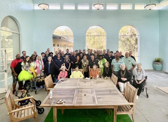 Toyota Material Handling North America and residents of Savannah Grand of Amelia Island gather for a group photo. Photo courtesy of Toyota material Handling North America
