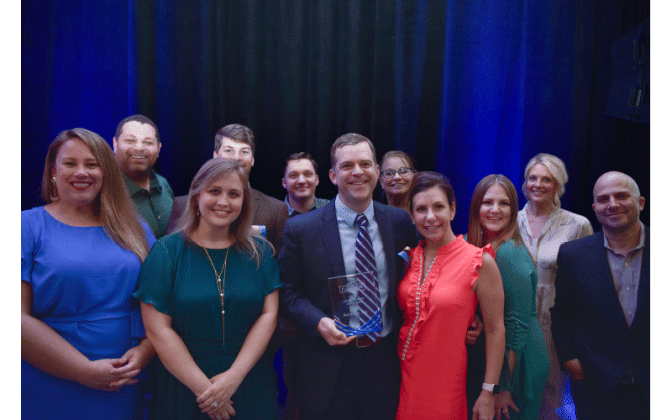 2022 Large Business of the Year: Rayonier Inc. Pictured: Rhett Rogers, Vice President, Portfolio Management, accepting the award on behalf of Rayonier Inc.