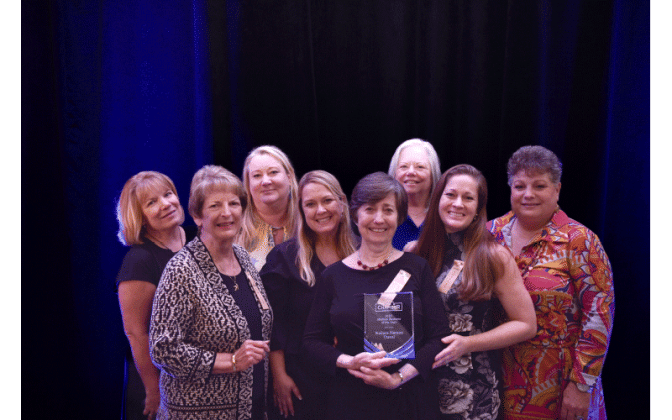 2022 Medium Business of the Year: Wallace Pierson Travel Pictured: Ange Wallace, President &amp; CEO, accepting the award on behalf of Wallace Pierson Travel