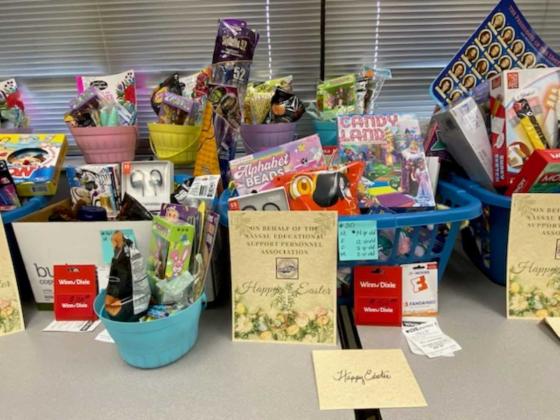 NESPA members brought enough gifts to fill the gift baskets to overflowing. Submitted photo