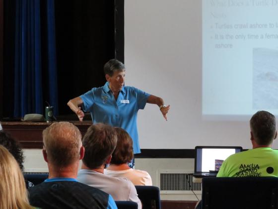 Amelia Island Sea Turtle Watch, Inc. President Mary Duffy leads the 2023 introductory meeting of the turtle watch. Duffy has more than 30 years of experience in identifying and marking turtle nests with the watch. Photo by Holly Dorman