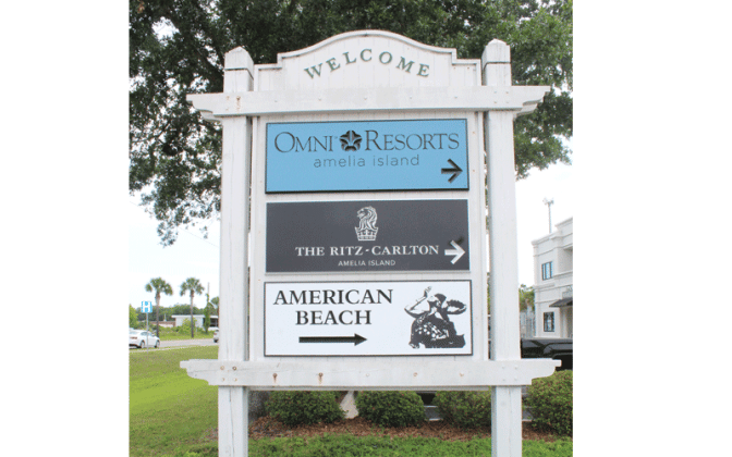 Fastsigns owner shows the way to historic American Beach. Submitted photo