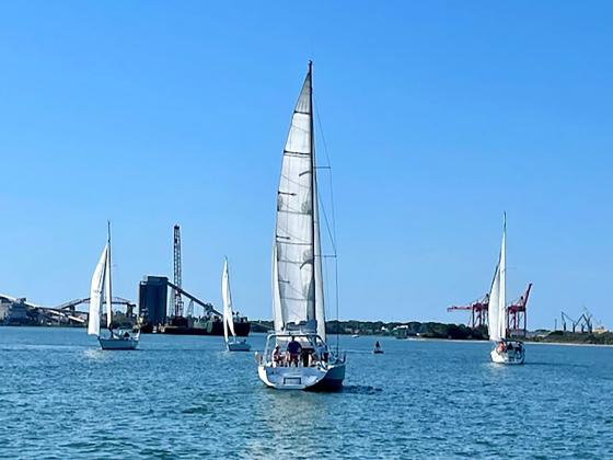 Boats round the first mark, left, during the Amelia Island Sailing Club’s fourth race of the season on Saturday. Misty close-hauled, right. Submitted photo