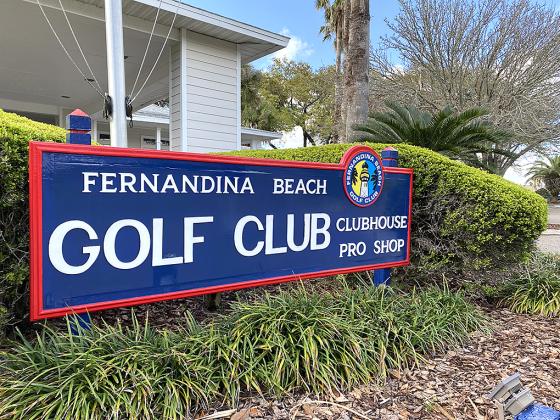 Lee Murray, top, is the president of the Friends of the Fernandina Beach Golf Club, which donated the mate-rials for the new signs at the city course. Photo by Beth Jones/News-Leader
