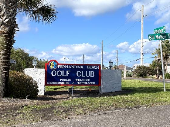 Lee Murray, top, is the president of the Friends of the Fernandina Beach Golf Club, which donated the mate-rials for the new signs at the city course. Photo by Beth Jones/News-Leader