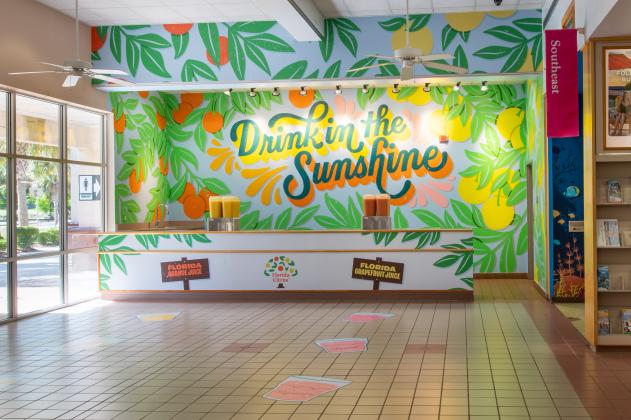 Local artist Lauren Hom partnered with Visit Florida and The Florida Department of Citrus to paint this mural welcoming visitors to Florida. Submitted photo