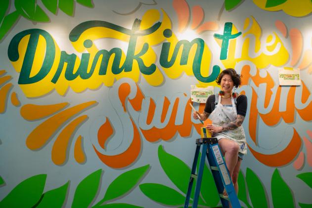 Local artist Lauren Hom partnered with Visit Florida and The Florida Department of Citrus to paint this mural welcoming visitors to Florida. Submitted photo