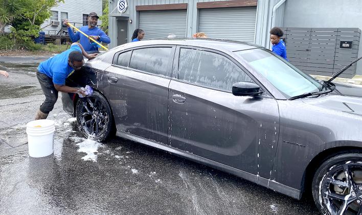 Nassau Ballerz are washing cars and raising money. Photos by Beth Jones/News-Leader