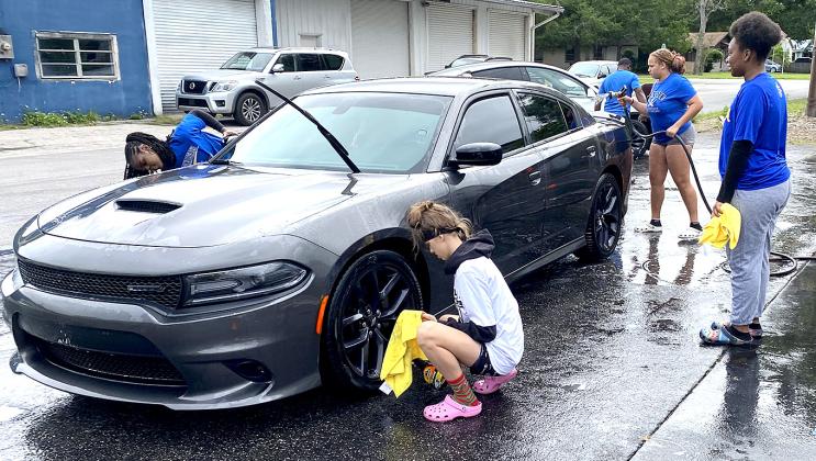Nassau Ballerz are washing cars and raising money. Photos by Beth Jones/News-Leader