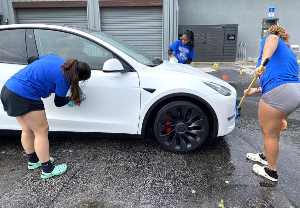 Nassau Ballerz are washing cars and raising money. Photos by Beth Jones/News-Leader