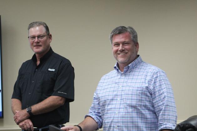 Matt McPhail, right, was introduced to the OHPA Commission by port operator senior director of operations Butch Gilbert. Photo by Julia Roberts/News-Leader
