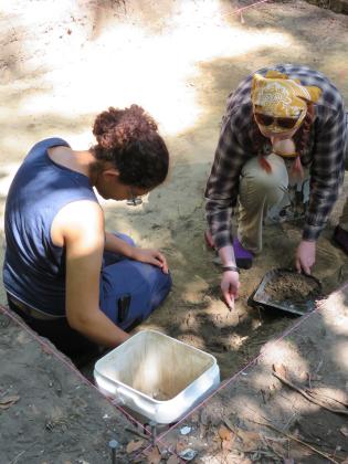 University of North Florida archeology students scoop dirt one spoonful at a time to search for artifacts. With the extra dirt, sifters rake through it searching for anything of note. Photos by Holly Dorman/News-Leader