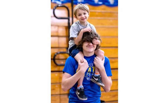 Fernandina Beach police officers stopped by the Fernandina Beach High School gym Tuesday and played dodgeball with the children attending the P.E. Camp this summer. Photos by Penny Glackin/Special