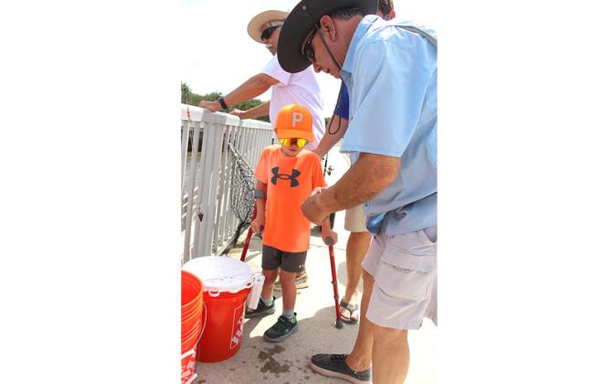 Brooks Rehabilitation offered adaptive fishing Wednesday at the Dee Dee Bartels Boat Ramp. The event was organized by Robert Springer and Alice Krauss. Submitted photo