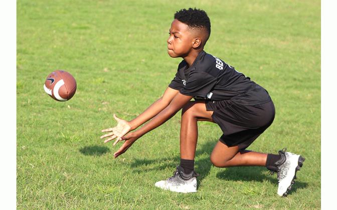 Football camp in Fernandina. Photo by Beth Jones/News-Leader