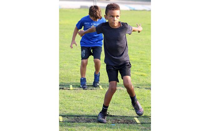 Football camp in Fernandina. Photo by Beth Jones/News-Leader