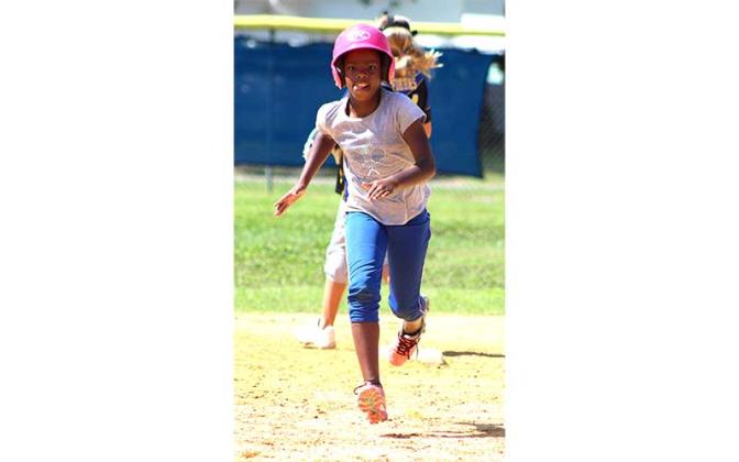 Elm Street little league holds softball camp. Photo by Beth Jones/News-Leader