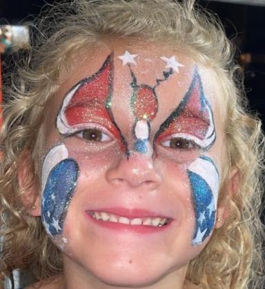 Facepainting was popular with the kids during the downtown celebration of Independence Day. Submitted photo