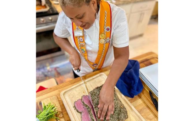 Chef Xylina Green getting ready to plate a meal. Submitted photo