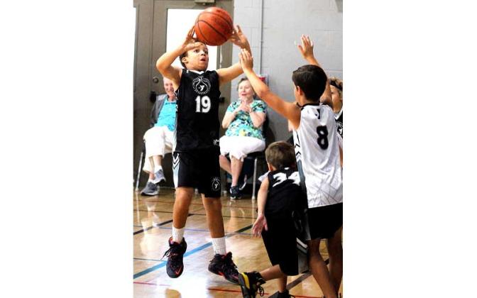 YMCA's youth basketball summer league. Photo by Beth Jones/News-Leader