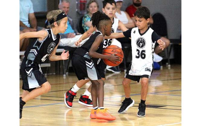 YMCA's youth basketball summer league. Photo by Beth Jones/News-Leader