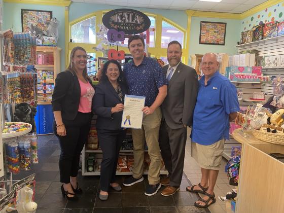 From left, Theresa Duncan, Administrator Guzman, Mayor Bradley Bean, Congressman Aaron Bean and Todd Duncan in Villa Villekulla Toy Store. Photo by Tracy Dishman